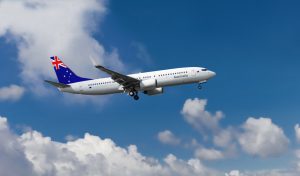 AirplaneWithFlagOfAustraliaOnTheTailFlyingOn - Mann Travel